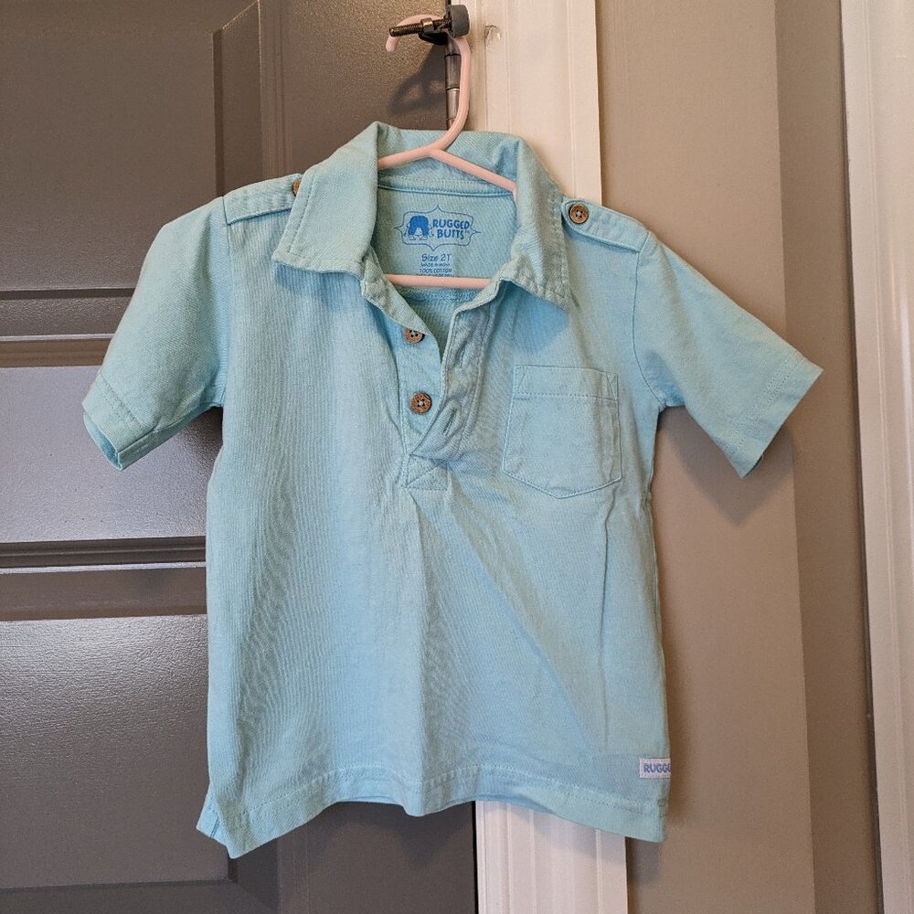 Rugged Butts short-sleeved polo shirt in sky blue, size 2T